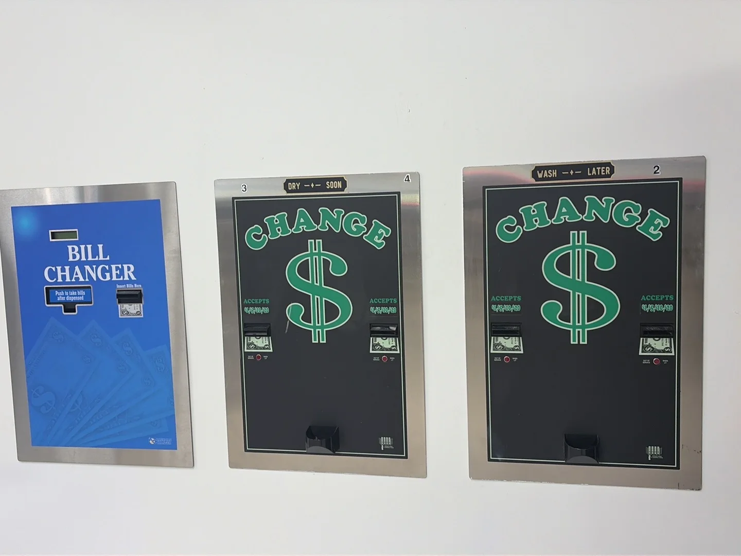 Bill changer and change machines available inside the laundromat