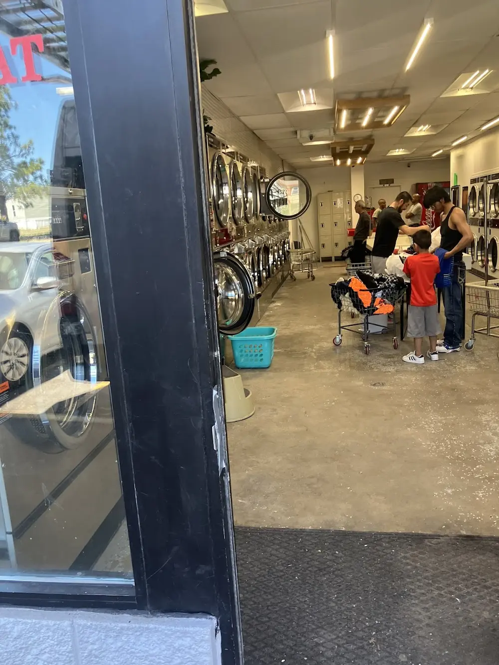 Clean washer and dryer area at Wash'em Up Laundry #5 - Laundromat Thornton